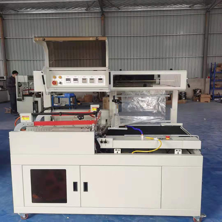 印刷用品封閉式包裝機器 日用品套膜封切機 常年供應 博鋒 紙盒套膜封切機